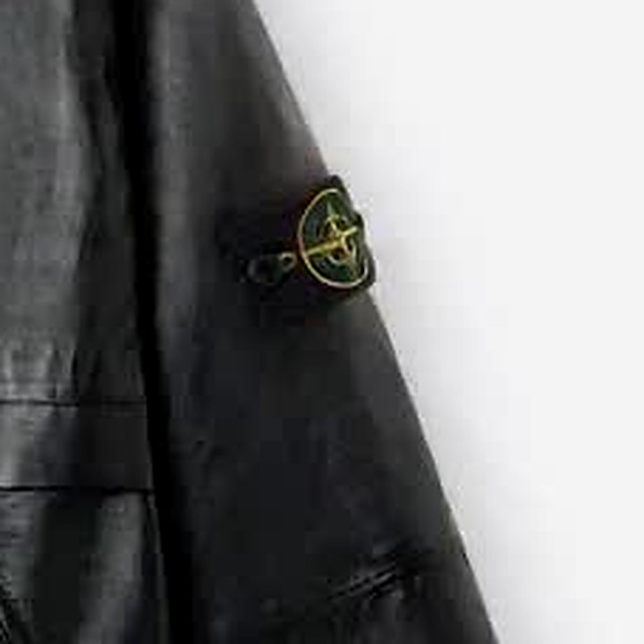 Stone Island compass badge on the coated sleeve